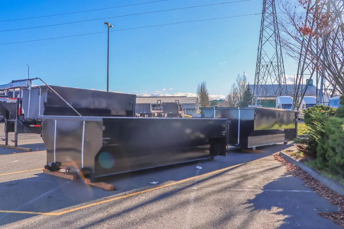 Roll-off dumpster ready for waste disposal at job site for Demolition Dumpster Rental in Elma